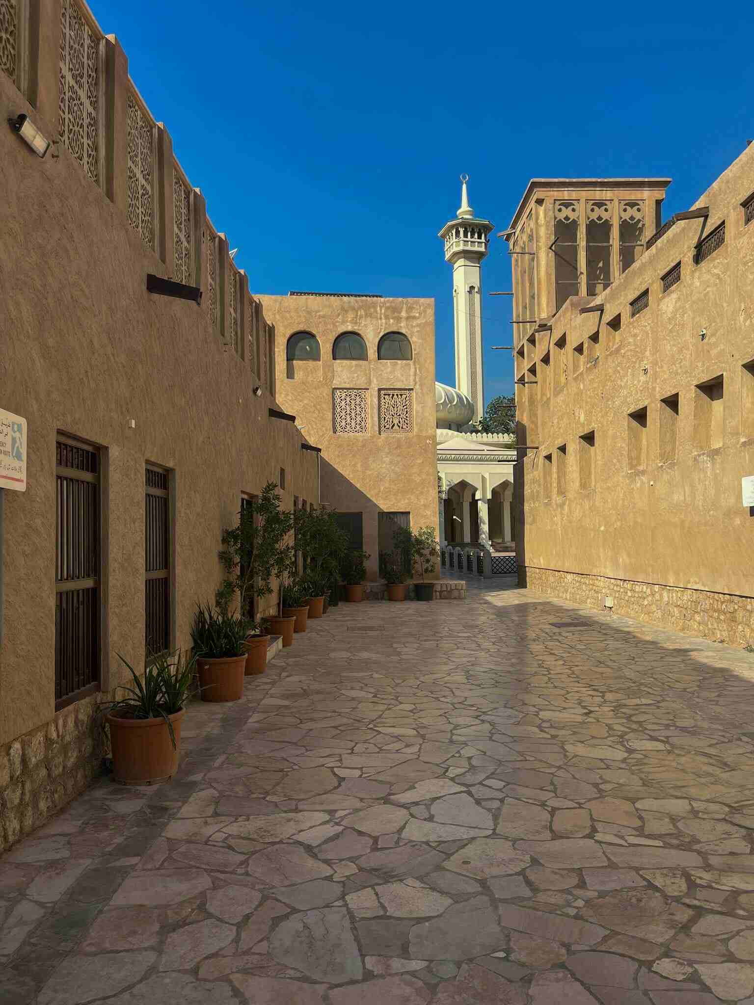 Explore the charming alleys of Al Fahidi, a historic area in Dubai, showcasing traditional architecture.