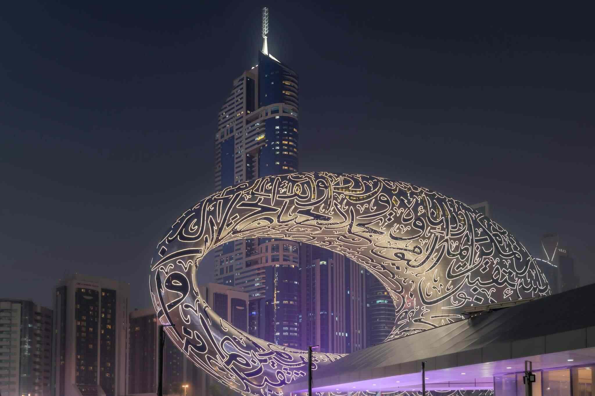 Stunning view of the Museum of the Future in Dubai, illuminated against a night sky backdrop.