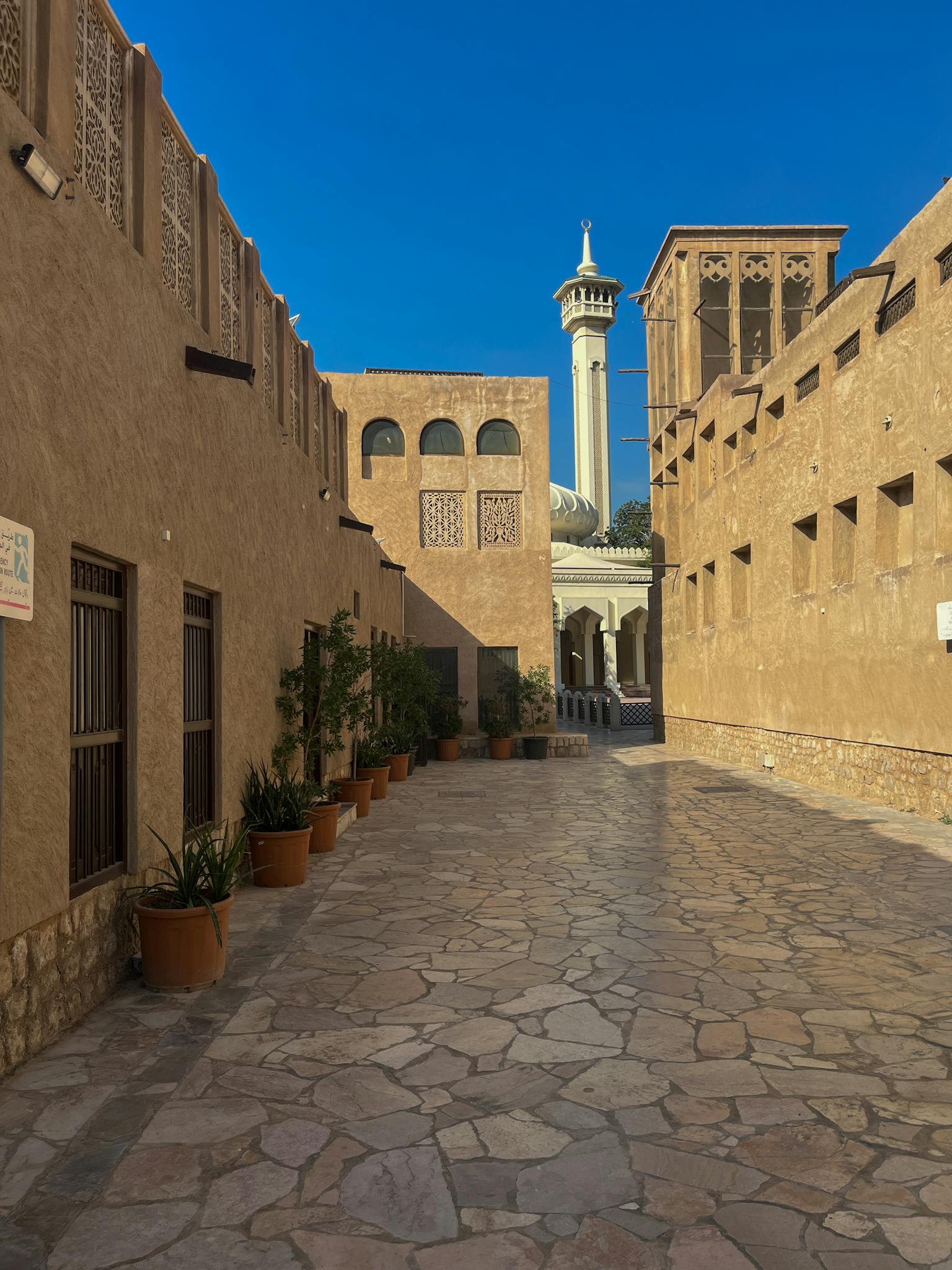 Explore the charming alleys of Al Fahidi, a historic area in Dubai, showcasing traditional architecture.