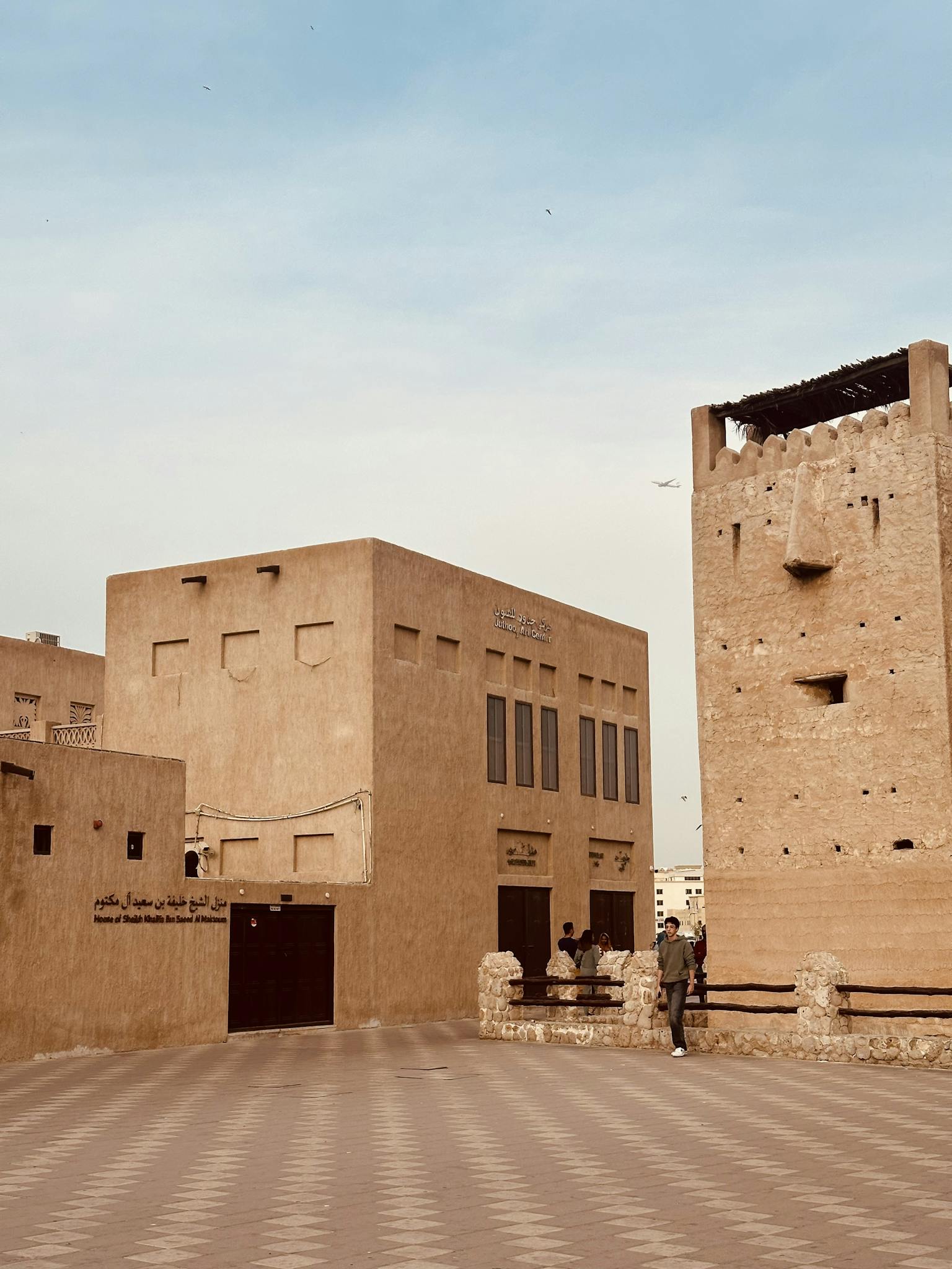 Explore traditional Emirati architecture in Dubai's historic Al Fahidi neighborhood.